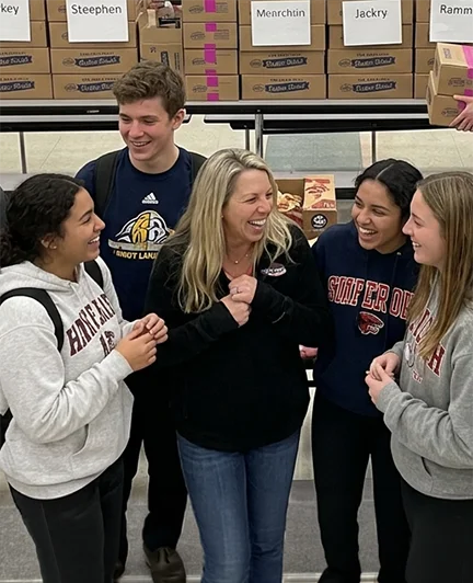 Successful school fundraiser group celebrating together