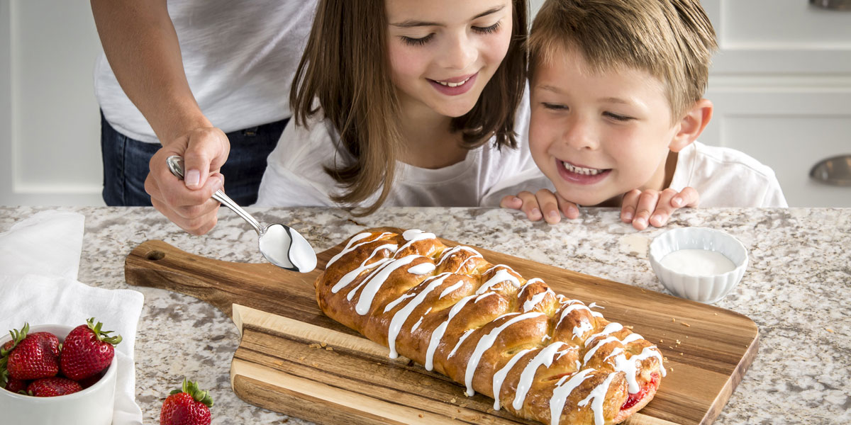 kids with butter braid pastry.jpg
